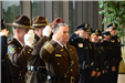 Officers stand at attention