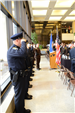 Officers stand at attention