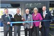 Commissioners Schulte, Kordiak, Gamache, West, and Look cutting the ribbon