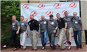 Comm. Schulte and organizers show off their red high heels