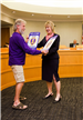 Veteran Chuck Jones presents Purple Heart sign to Commissioner Sivarajah