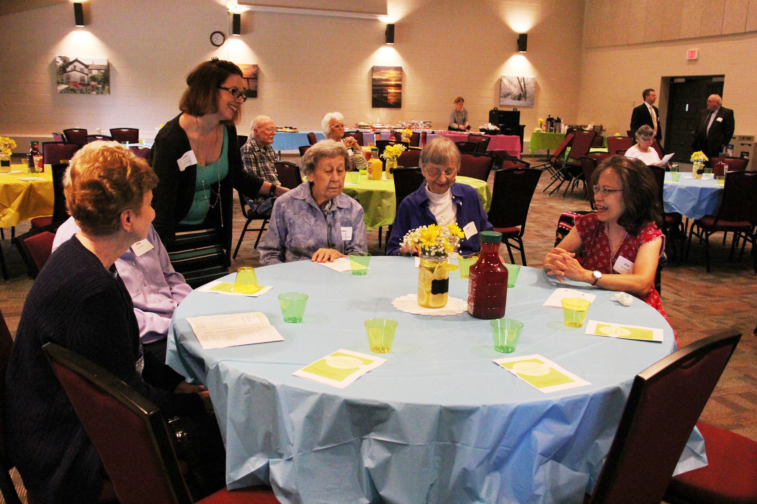 RSVP event guests sitting at a table