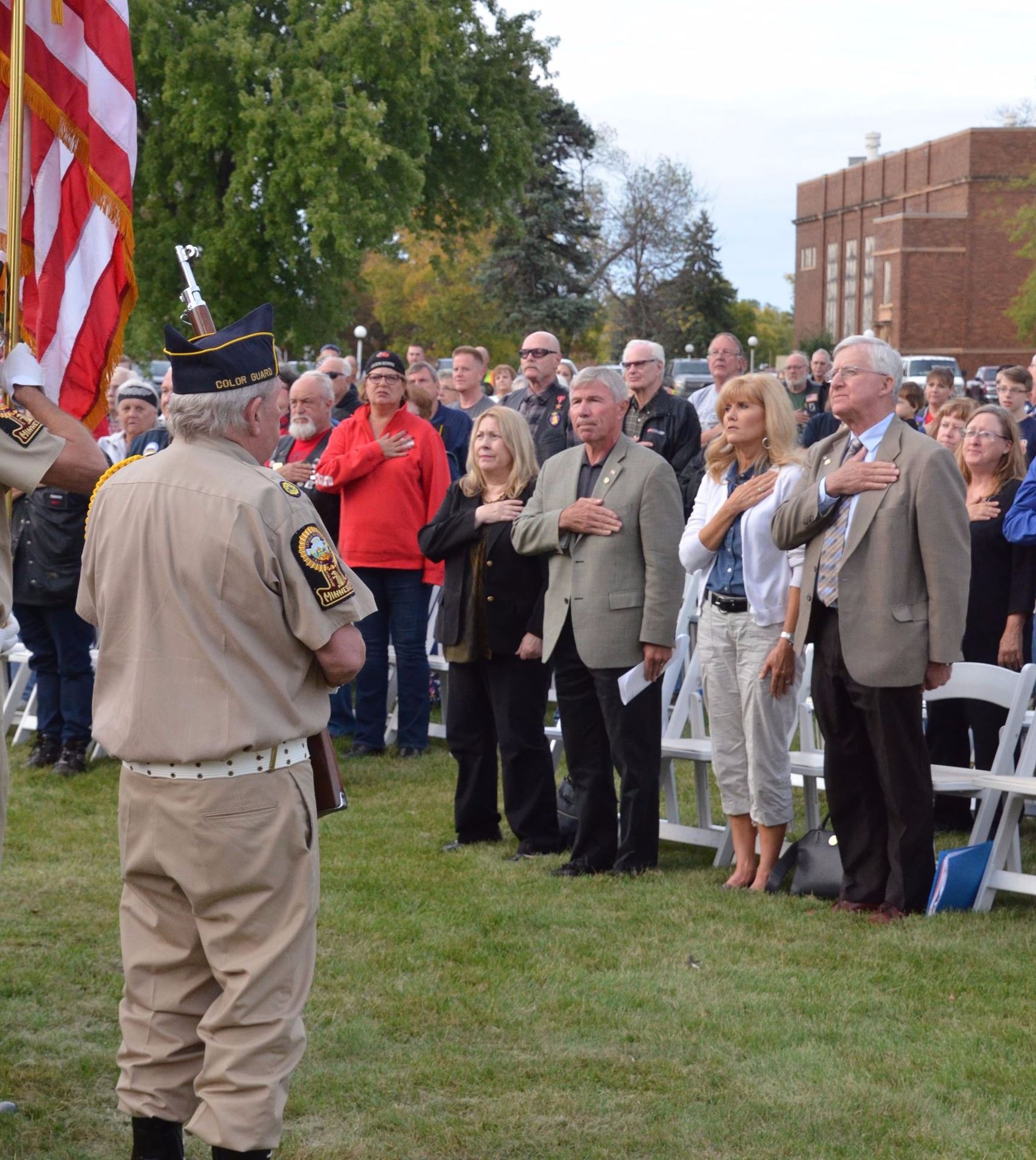 Attendees stood for the pledge of allegiance 
