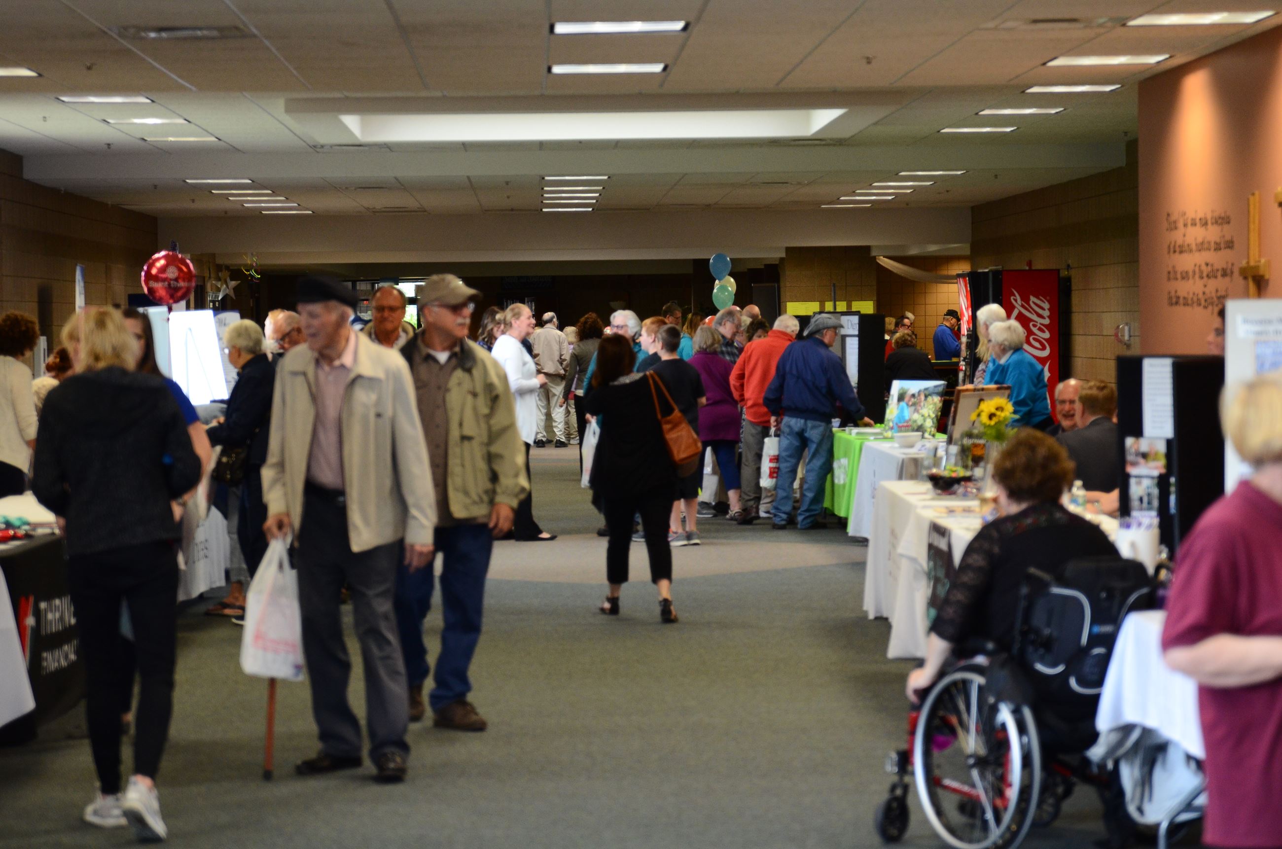 Visitors view displays at the Senior Expo
