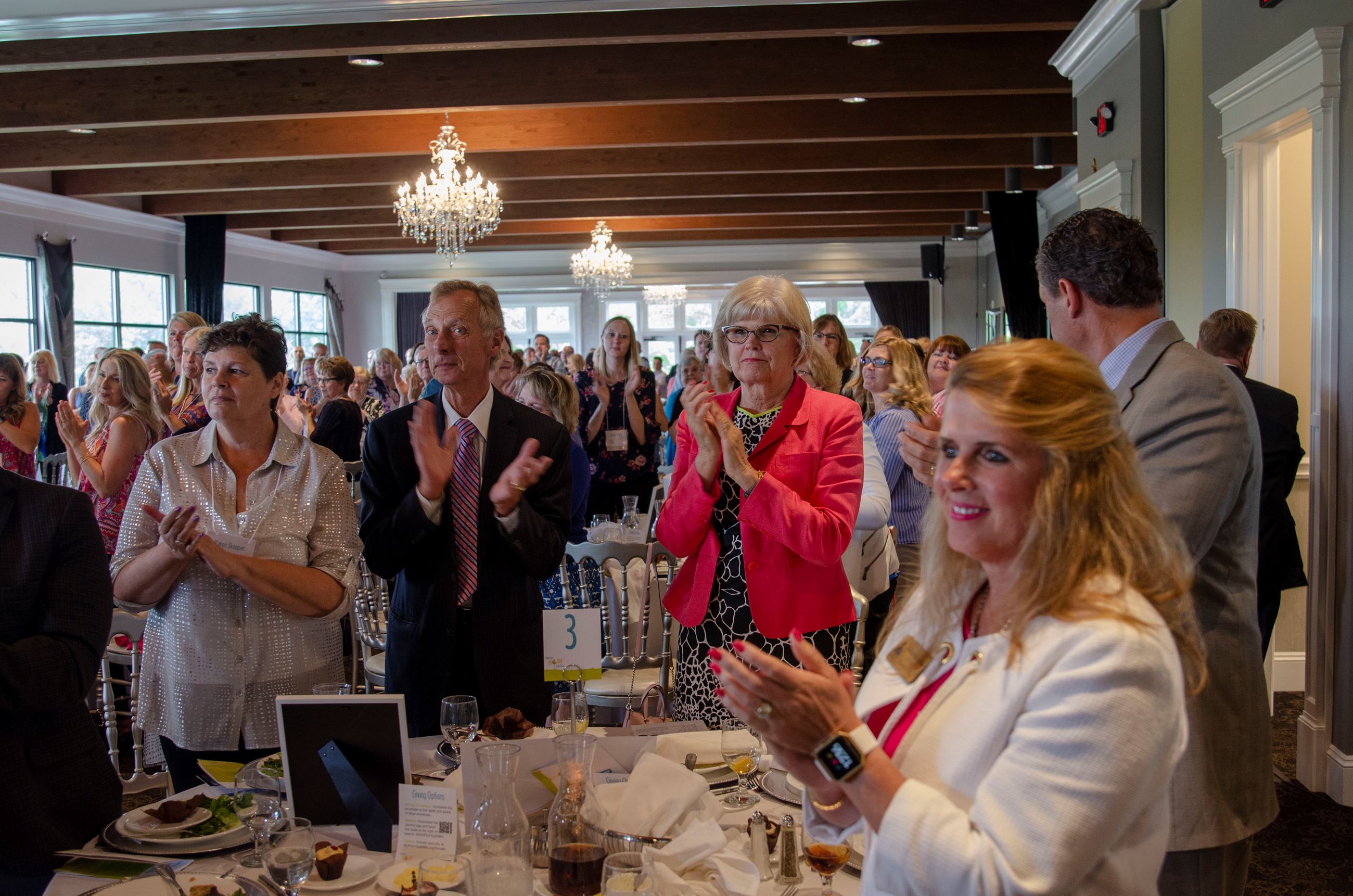 Commissioners Look, Kordiak, Schulte, West and Braastad applauding speakers TJ and Jenaa