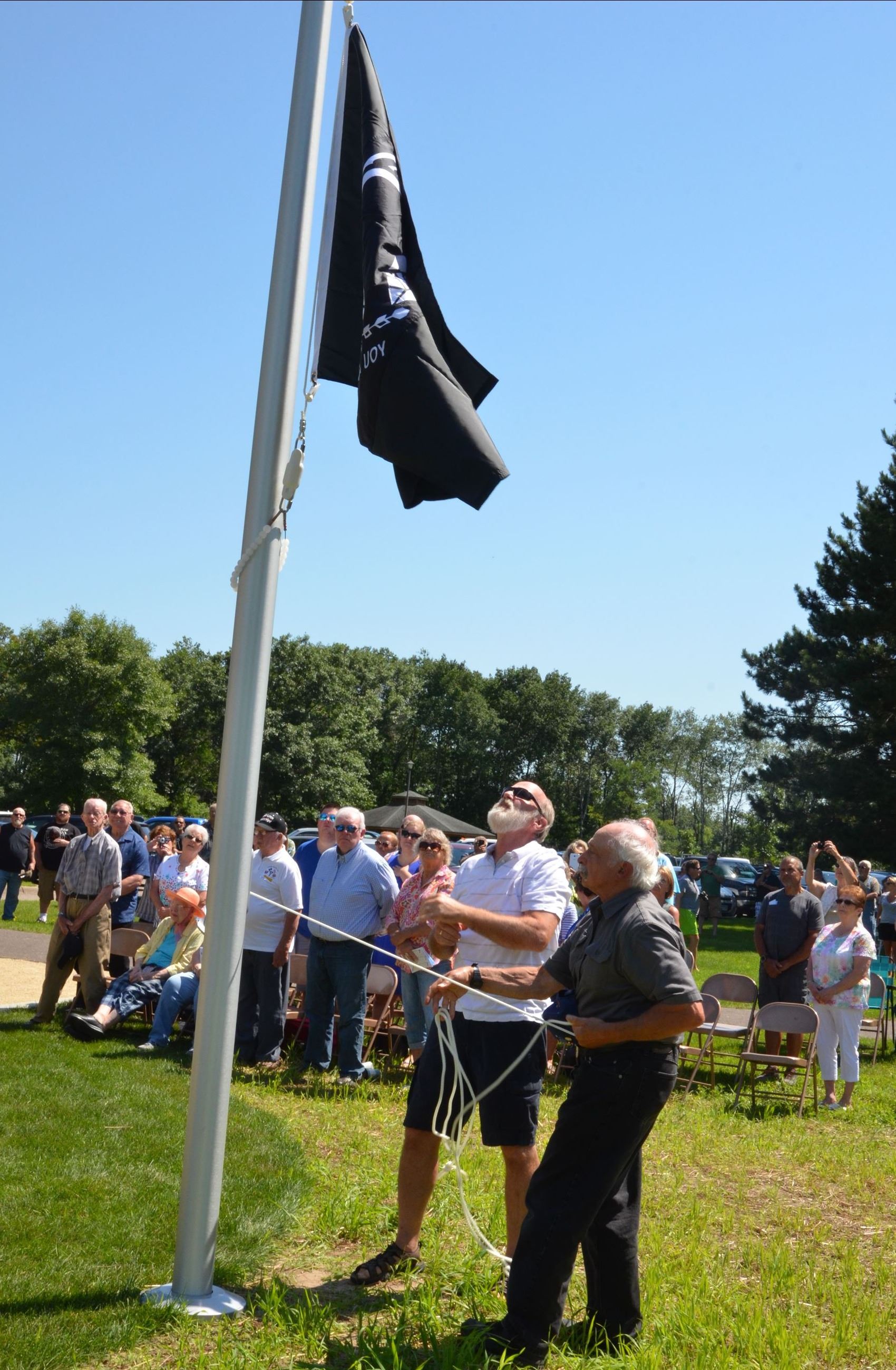 Veterans raise the flag