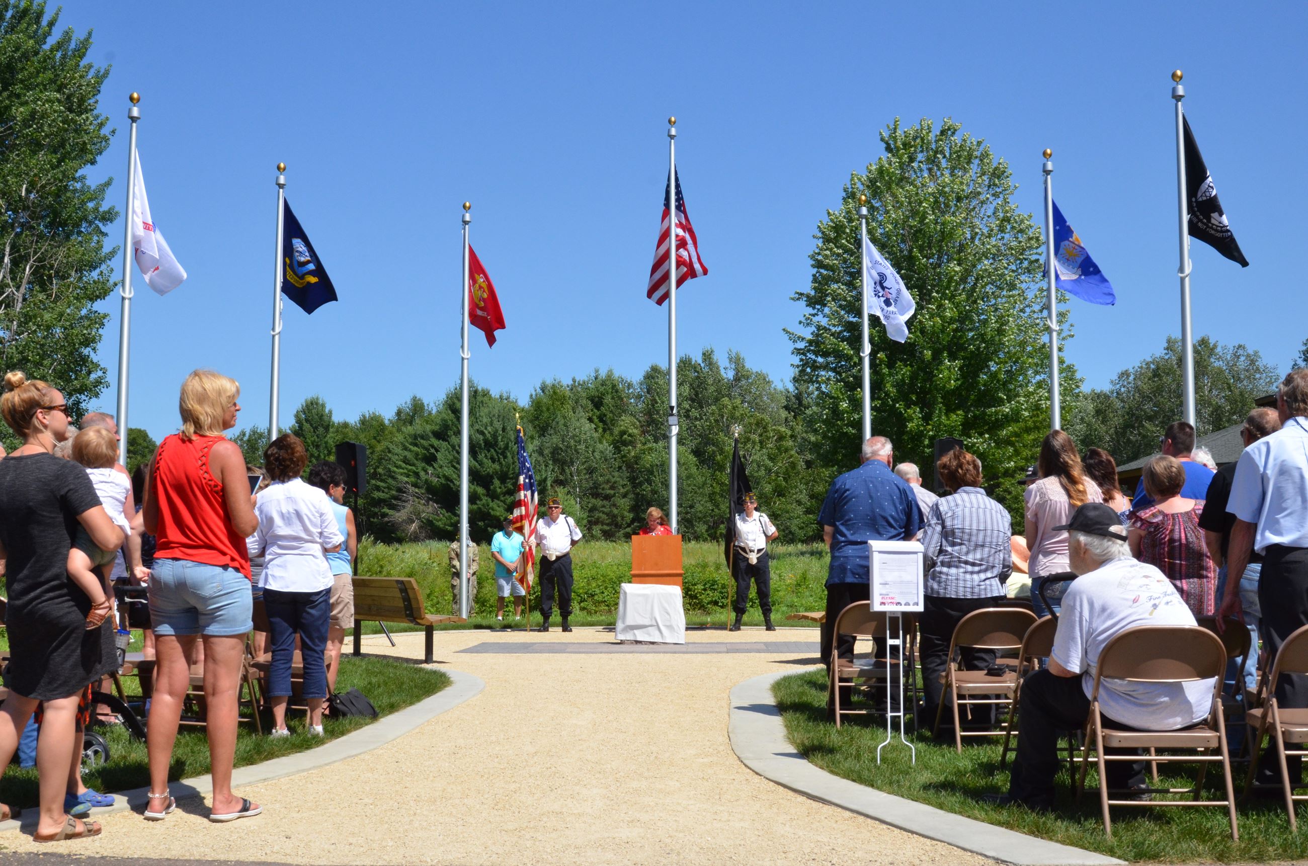 Commissioner Braastad speaks at the service